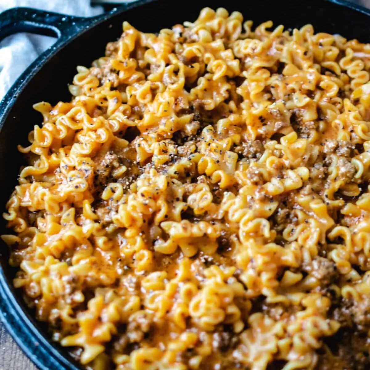 cast iron pan of homemade hamburger helper lasagna