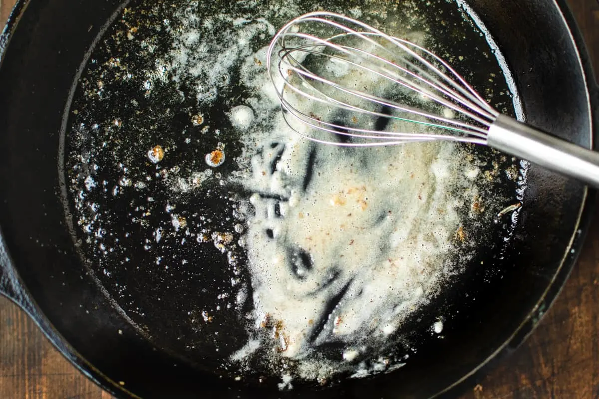 Flour whisked into grease in a cast iron skillet.