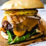 Aloha burger with grilled pineapple ring, onion and Aloha sauce on a bun