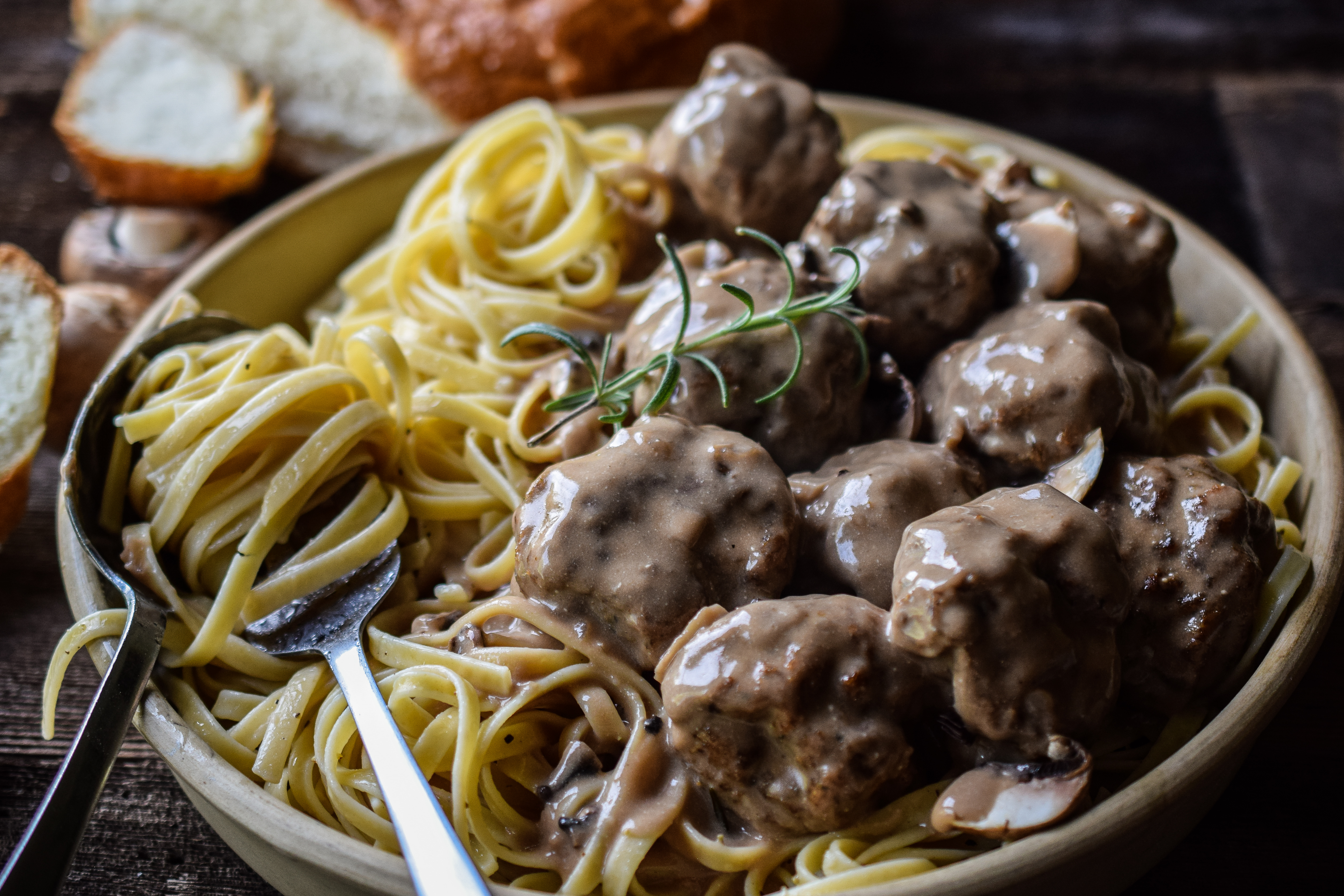 Meatballs in a mushroom gravy with pasta.