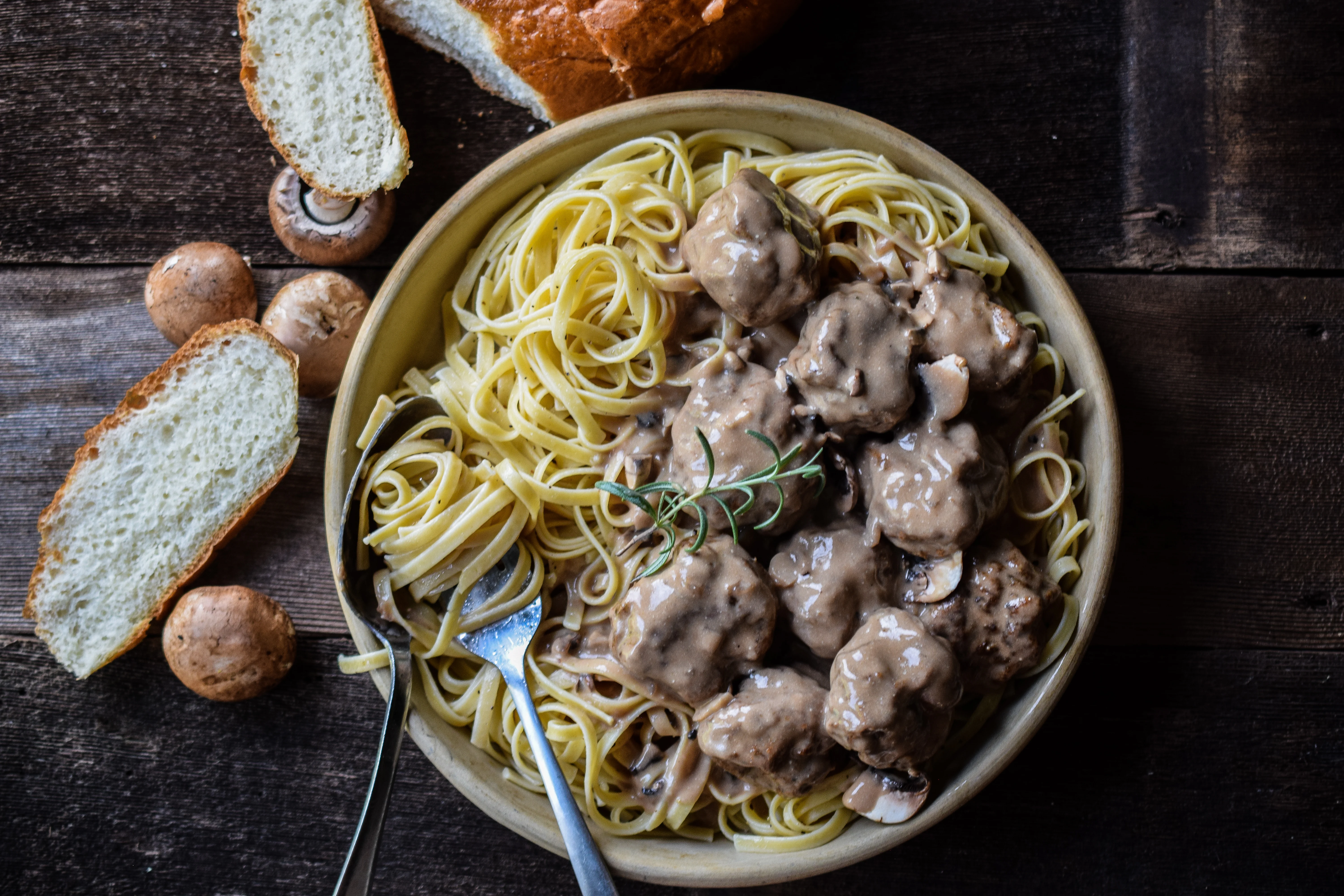 A plate of Swedish meatballs in mushroom gravy.