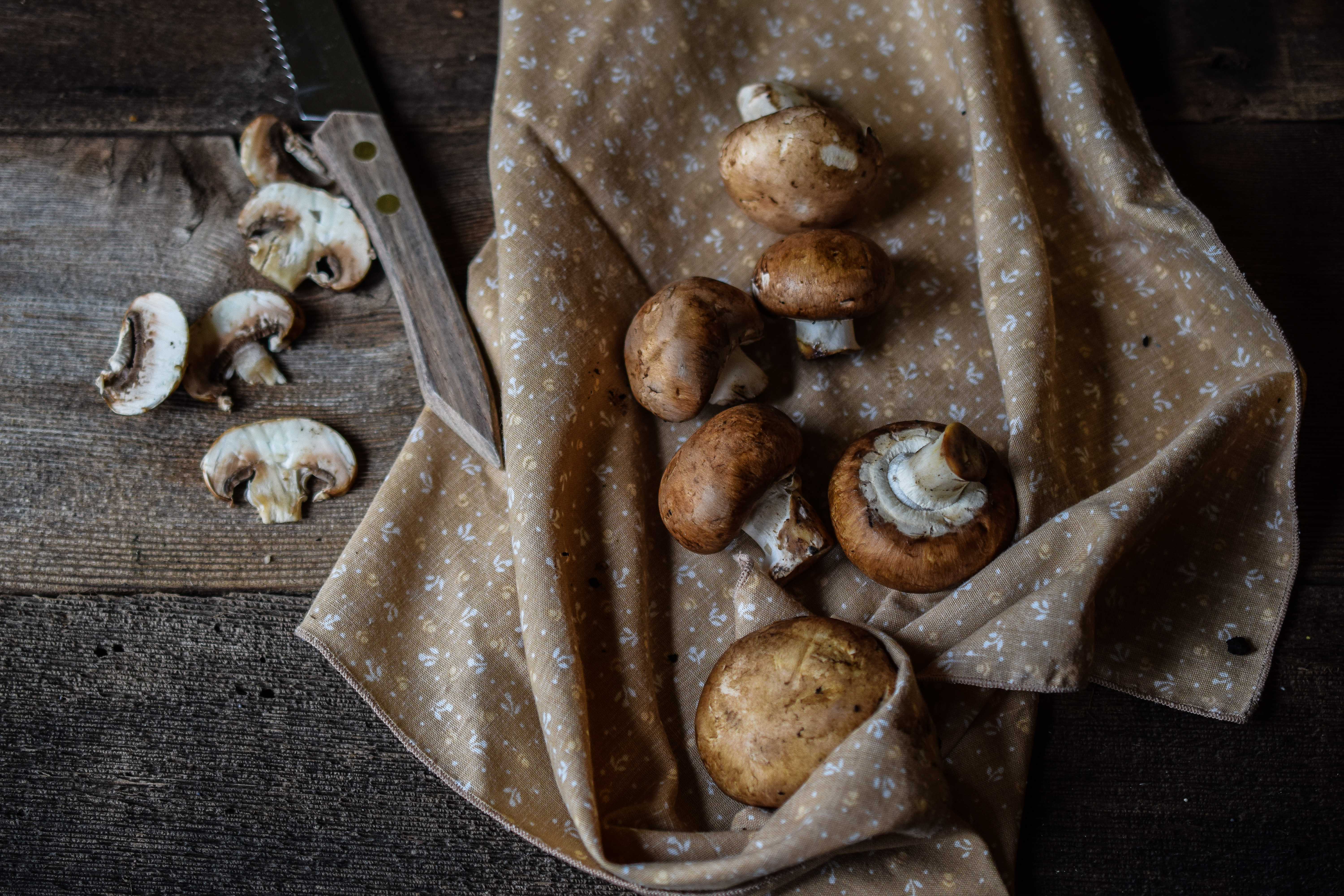 Mushrooms on a wooden table.