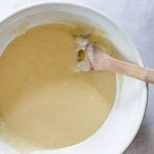eggs, sugar and vanilla being mixed until pale in color