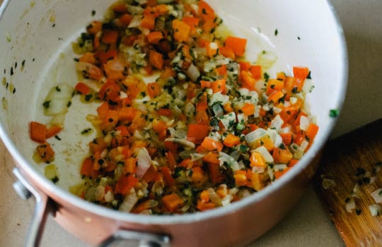 DSC_0874 small sauce pan of minced red bell pepper, onion, garlic, and spices sauteed in butter with parsley