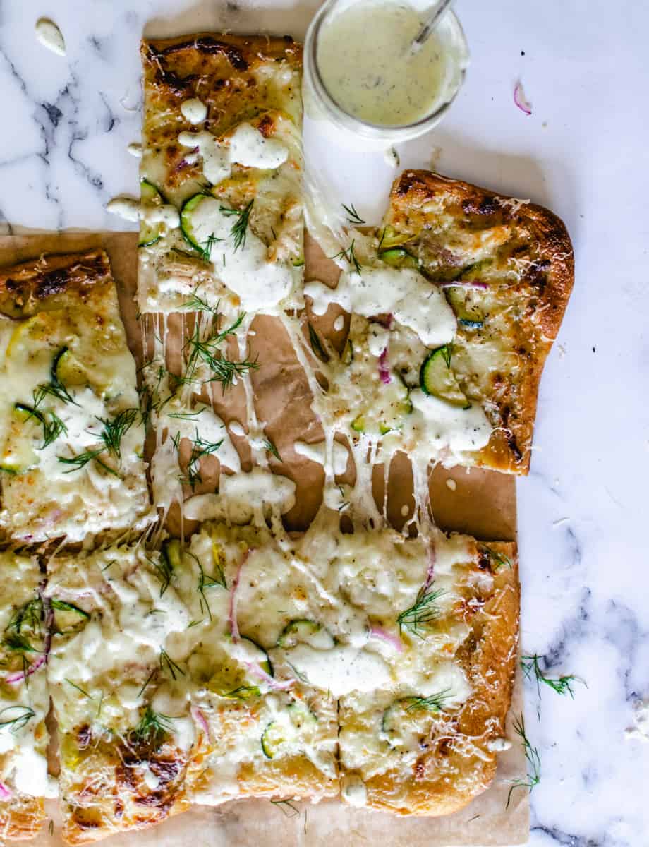 Garlic Chicken Ranch Zucchini Pizza garnished with fresh dill and ranch dressing