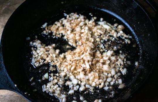 DSC_0202 minced onion and garlic sauteing in a pan