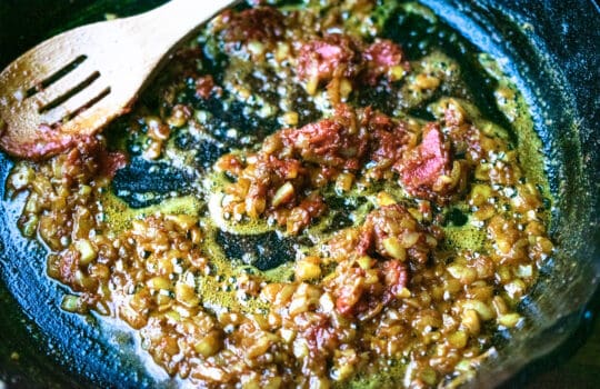 DSC_0204 minced onion and garlic sauteing in a pan with indian spices and tomato paste