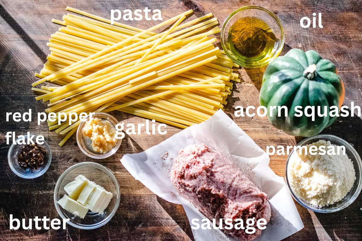 Pasta, acorn squash, garlic, butter, oil, Parmesan, sausage, and red pepper flake. 