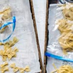 Homemade pasta shapes in zip lock freezer bags, to be frozen.