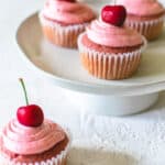 cherry cupcakes with cherry frosting and cherry on top