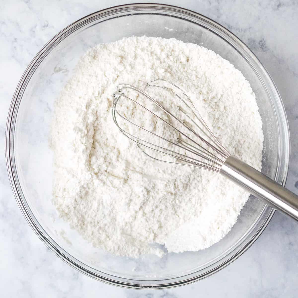 Bowl of flour, baking powder and salt.