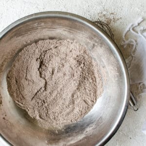 cocoa powder, flour and baking soda combined in a mixing bowl