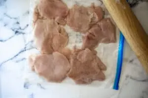chicken breast halves, cut on the bias, pounded with a rolling pin to uniform thickness in a zip lock bag.