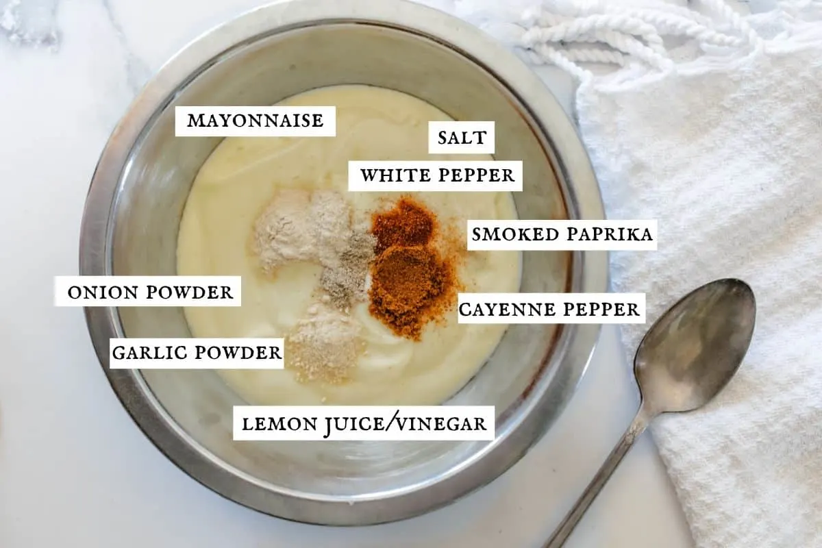 Spices and mayonnaise in a bowl.