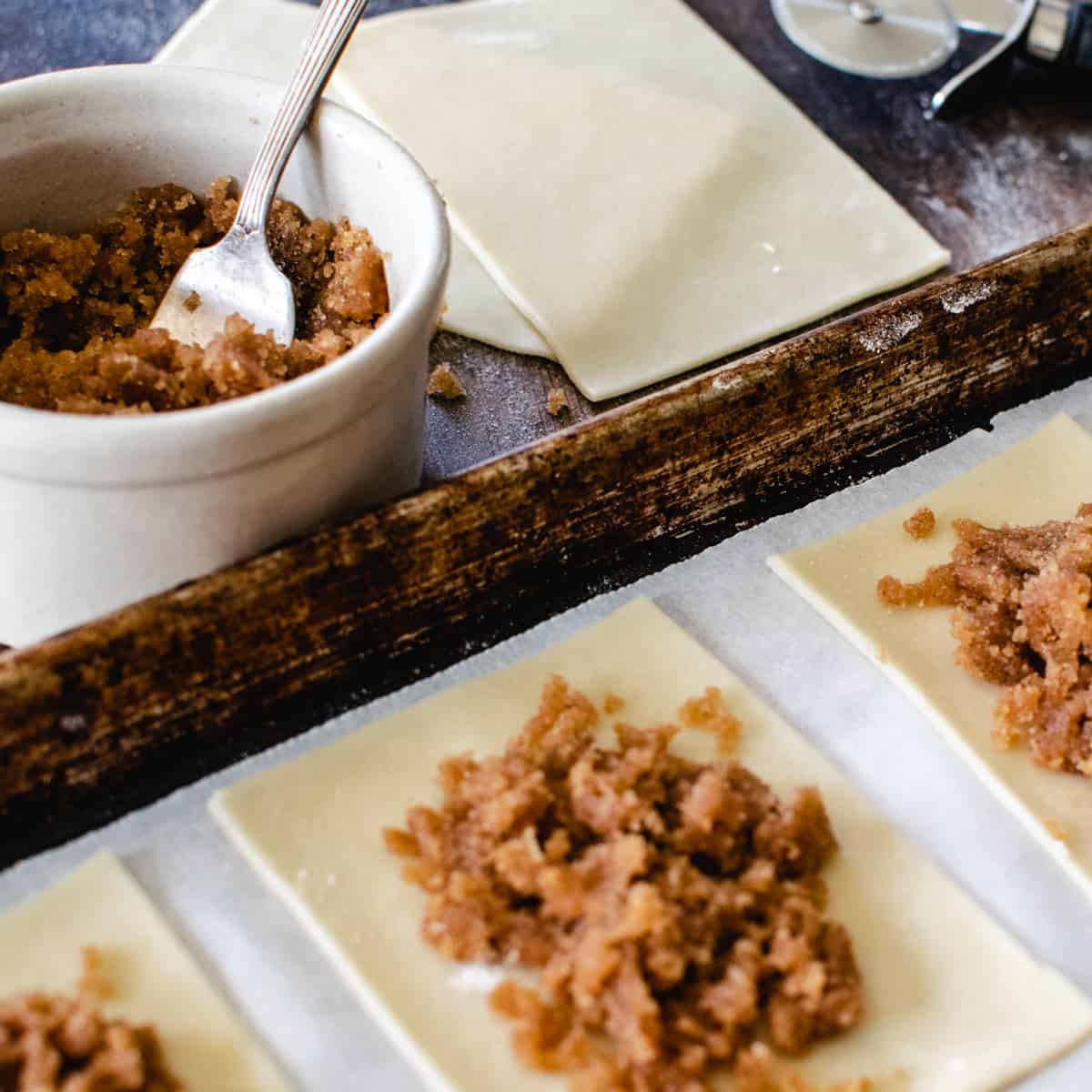 Pop tart dough rectangles being filled with brown sugar filling.