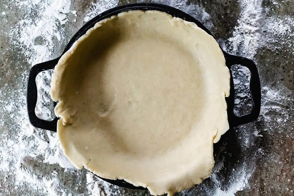 Pie crust pressed into a pie pan.