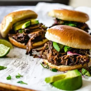 Pulled beef on brioche buns with cabbage and avocado.