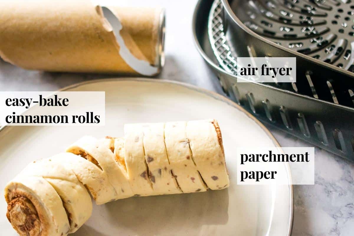 Labeled photo of items needed to make cinnamon rolls in an air fryer. 
