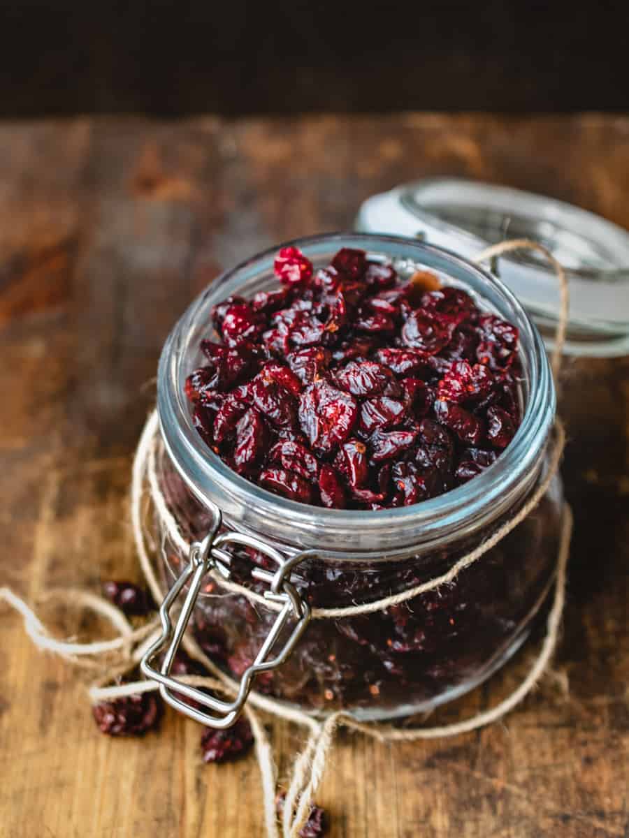 A jar of dried cranberries.