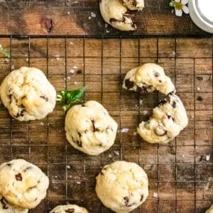 Chocolate chip cookies baked without brown sugar cooling on a baking rack.