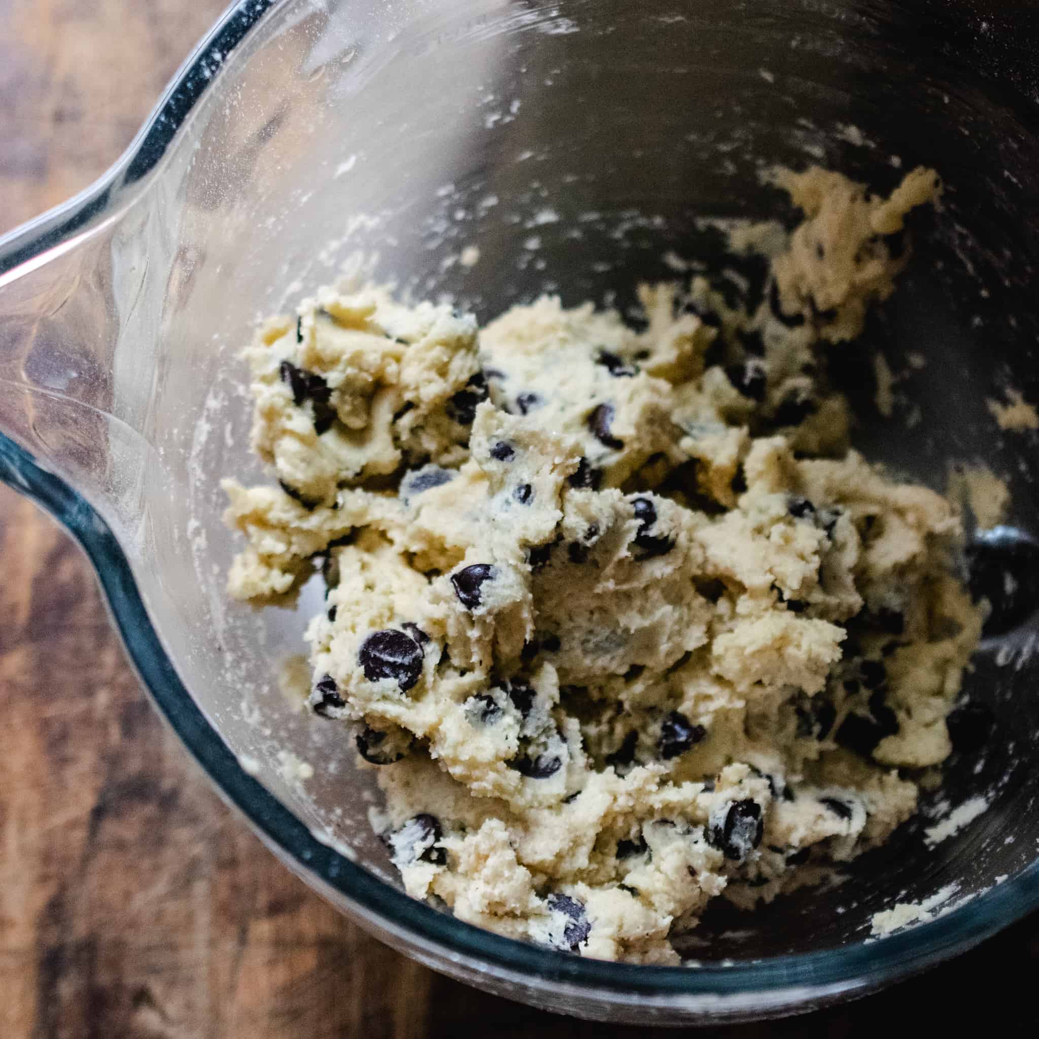 Brown sugar free chocolate chip cookie dough in a mixing bowl.