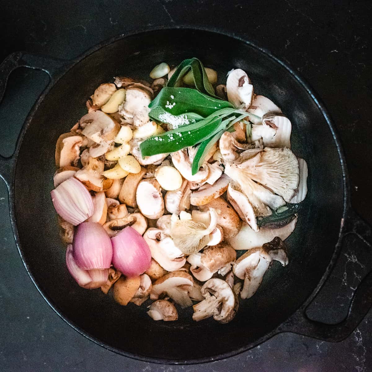 Mushrooms, garlic, shallot, sage, salt, pepper and vinegar in a stock pot.