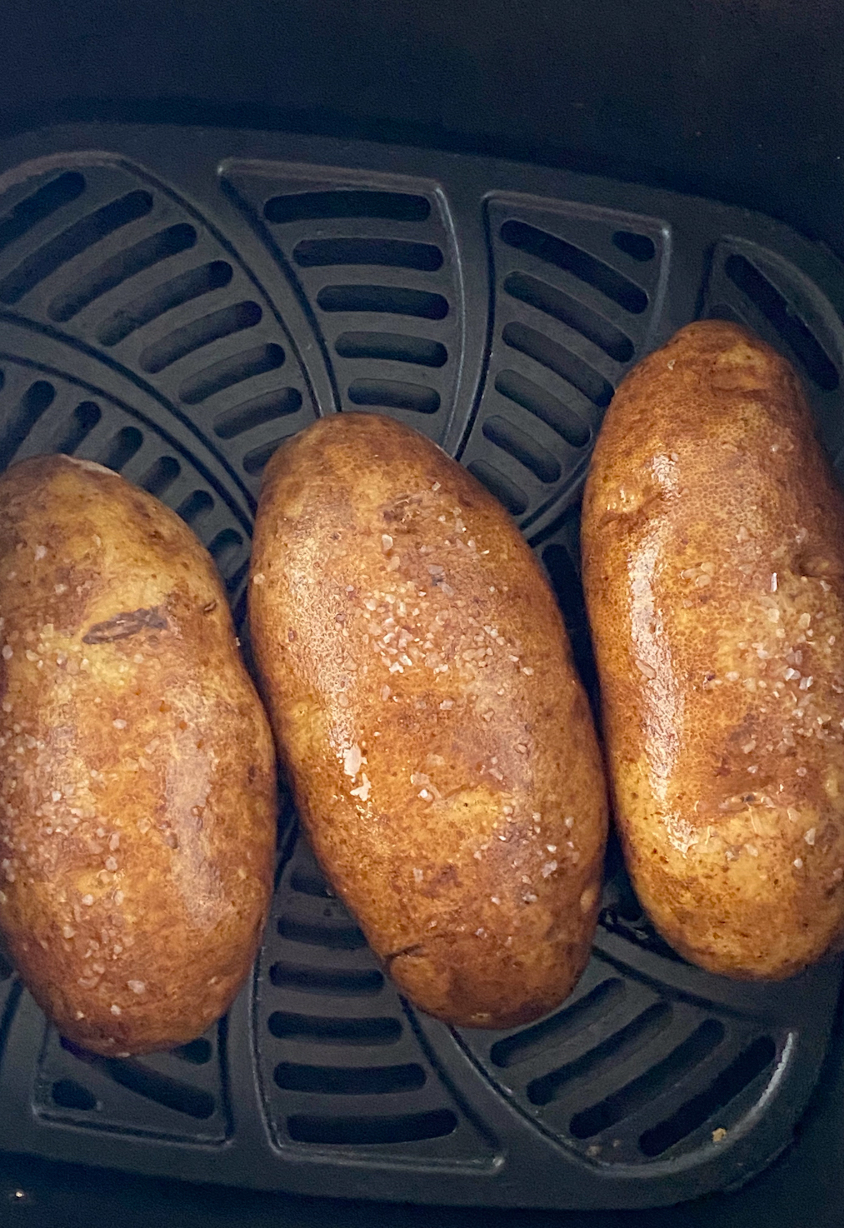 russet potatoes in air fryer basket