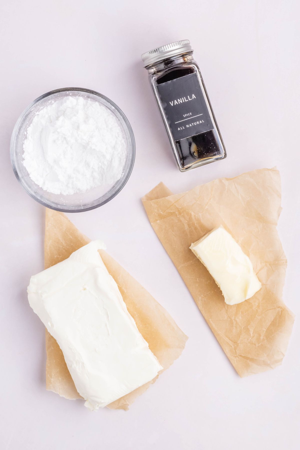 Cream cheese, powdered sugar, vanilla extract, and butter.