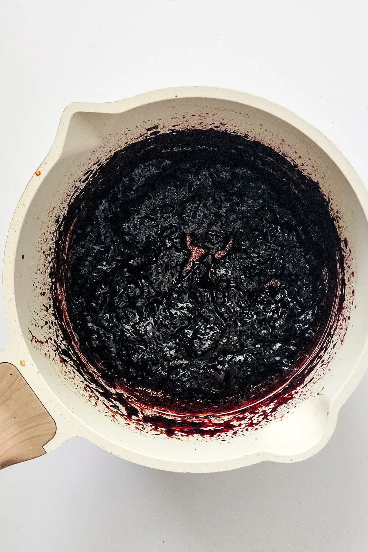 The start of Mixed Berry Jam in a skillet.