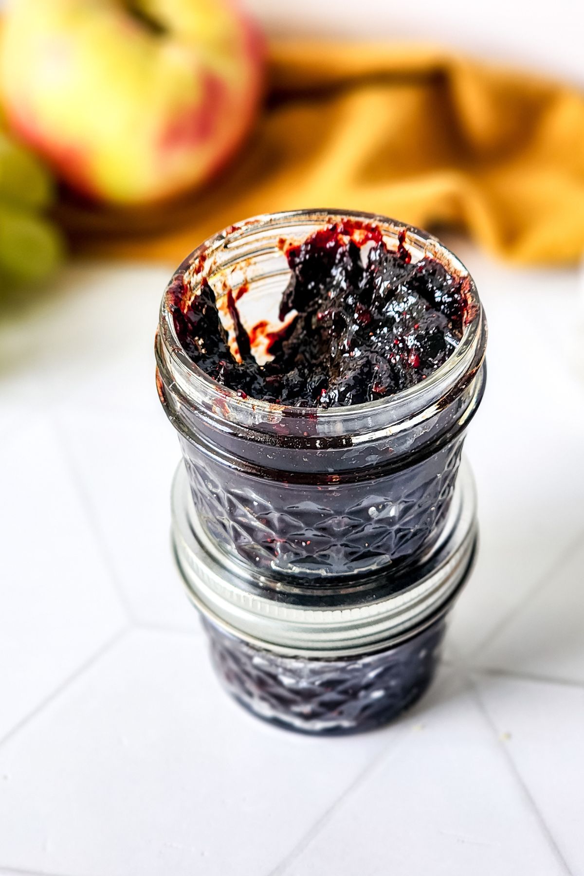 Two small jars of Mixed Berry Jam.