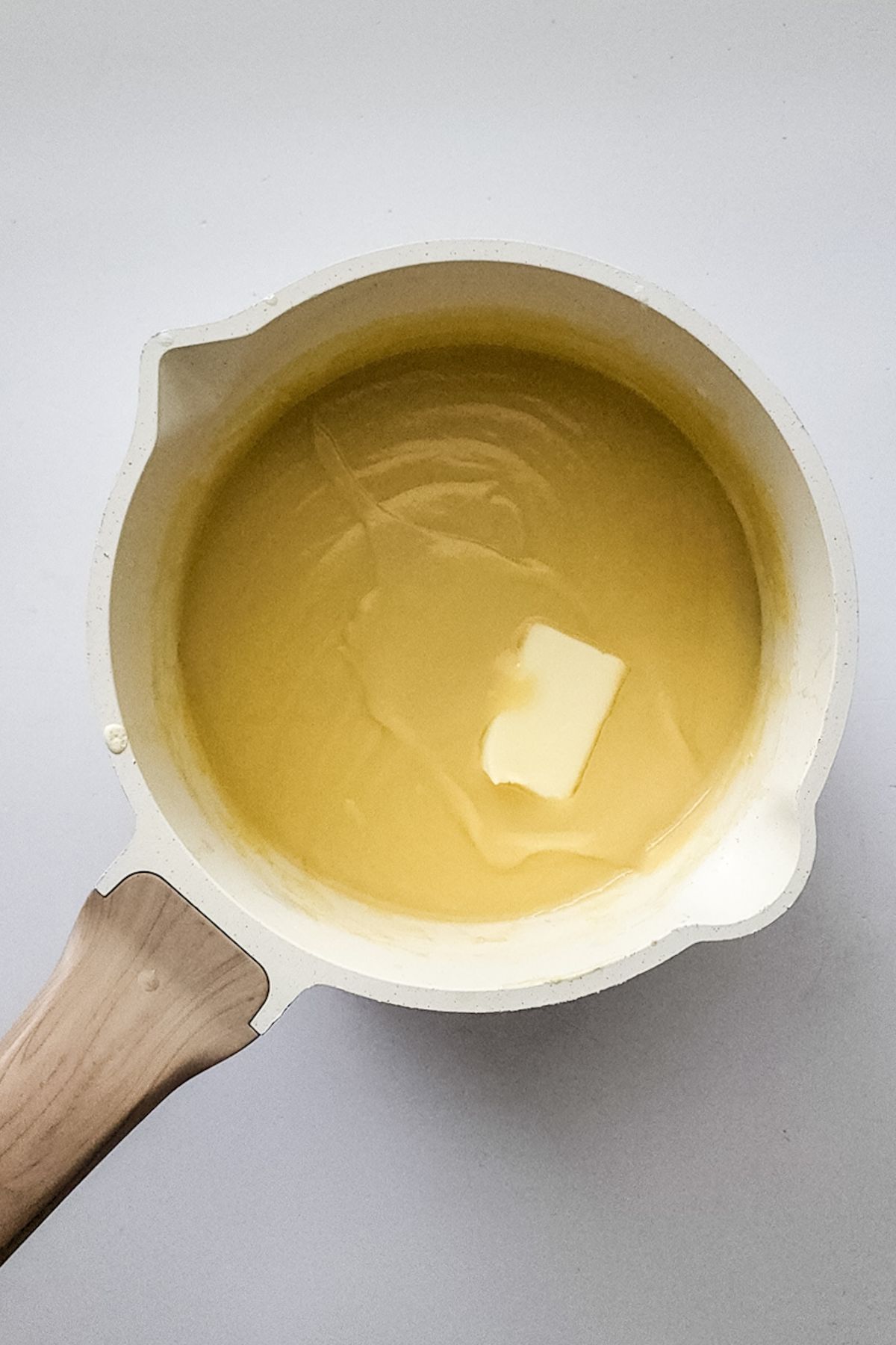 Custard mix with butter in the pan.