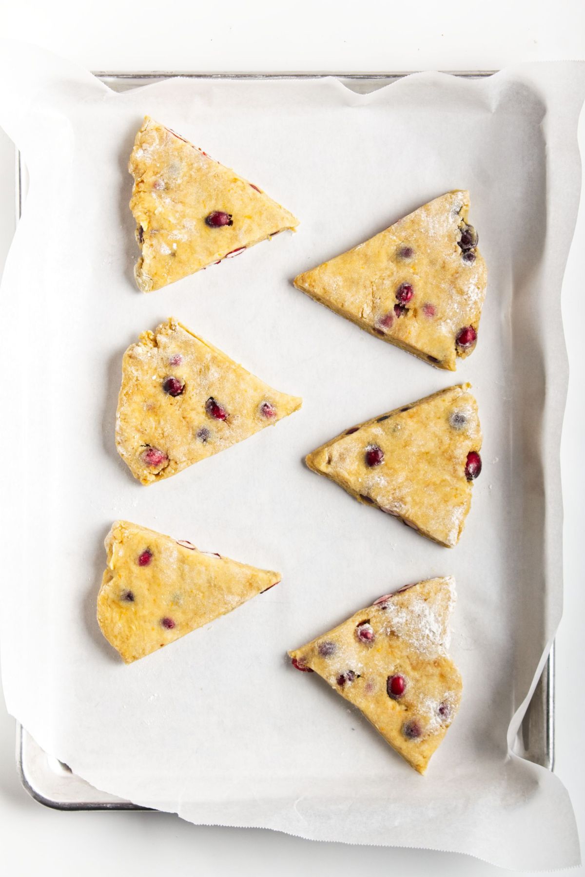 Cut scones on a baking sheet lined with parchment paper.